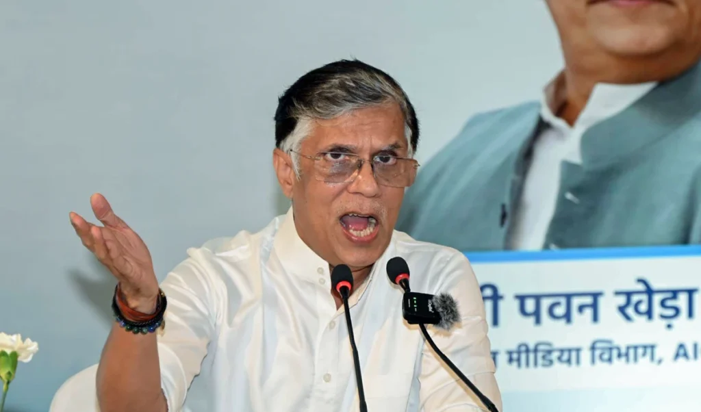 George Soros पर घिरी BJP? Pawan Khera ने Kiren Rijiju से पूछा – किस मंत्री ने की मुलाकात?