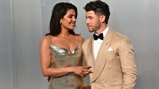 Priyanka Chopra chooses showstopping silver dress for Oscar afterparty, Nick Jonas keeps it classy in beige look: Pics Priyanka Chopra chooses showstopping silver dress for Oscar afterparty, Nick Jonas keeps it classy in beige look: Pics