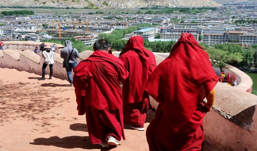 china tightens its grip on tibet imprisons two buddhist monks for a year over sensitive photos