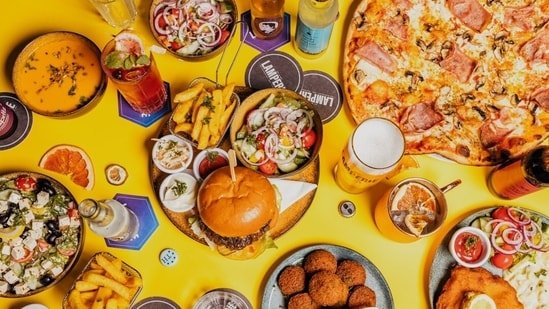 Tamannaah Bhatia’s trainer reveals how fast food can fit into your fat loss journey without any guilt Tamannaah Bhatia’s trainer reveals how fast food can fit into your fat loss journey without any guilt