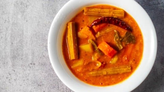 Healthy South Indian Drumstick And Tomato Sambar, A Nourishing Protein-Packed Dish With Vegetables And Spices Healthy South Indian Drumstick And Tomato Sambar, A Nourishing Protein-Packed Dish With Vegetables And Spices