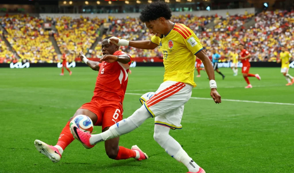 FIFA World Cup 2026 | 72 साल बाद विश्व कप के क्वार्टर फाइनल में पहुंचा स्विट्जरलैंड, पेनल्टी शूटआउट में कोलंबिया को चटाई धूल, अर्जेंटीना से होगी भिड़ंत FIFA World Cup 2026 | 72 साल बाद विश्व कप के क्वार्टर फाइनल में पहुंचा स्विट्जरलैंड, पेनल्टी शूटआउट में कोलंबिया को चटाई धूल, अर्जेंटीना से होगी भिड़ंत