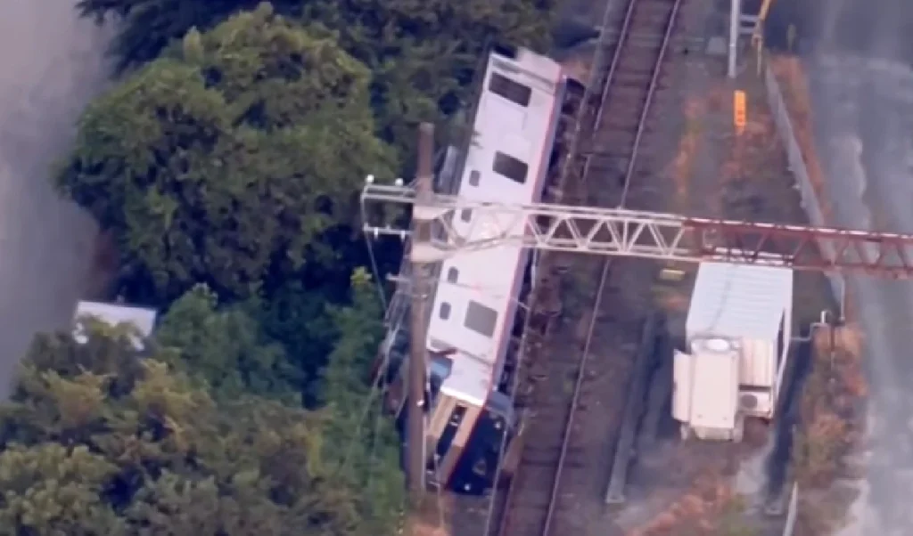 distressing images of the earthquake in japan train overturned like a toy