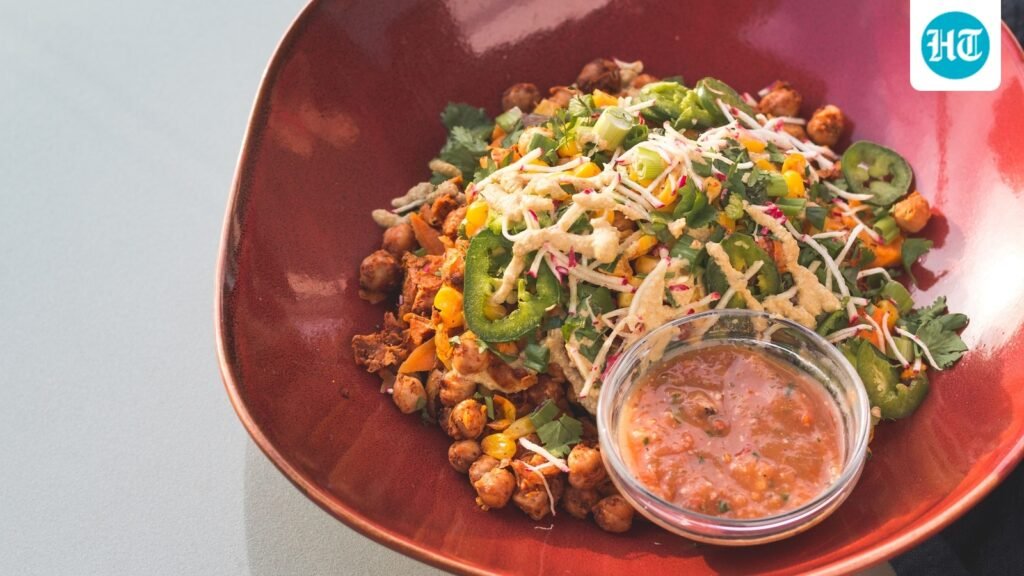 Elevate your everyday meal with this loaded mixed dal burrito bowl recipe served with creamy dahi dip and paneer