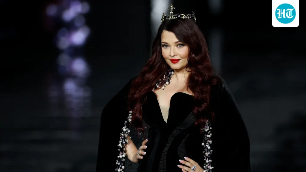Aishwarya Rai goes full ‘Maleficent’ at L’Oréal Paris Fashion Week runway in velvet gown and cape with bold red hair