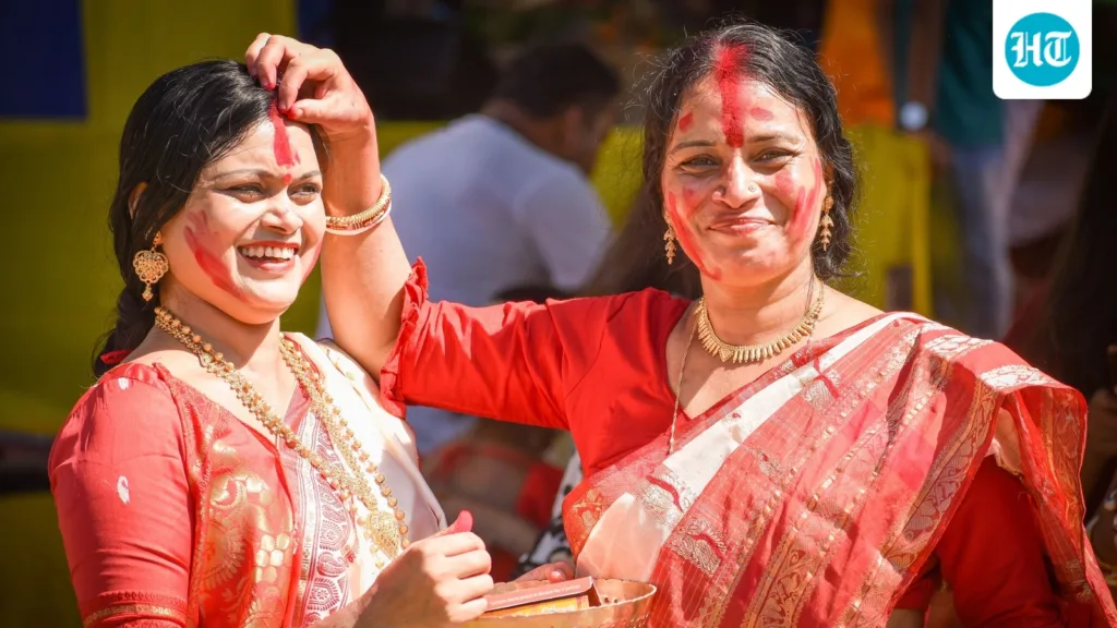 Why do Bengali women wear white sarees with red borders during sindoor khela? The history and symbolism behind the tradition Why do Bengali women wear white sarees with red borders during sindoor khela? The history and symbolism behind the tradition
