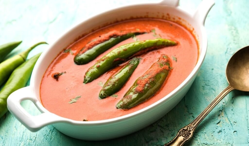 easy recipe to make traditional rajasthani spicy stuffed besan mirchi